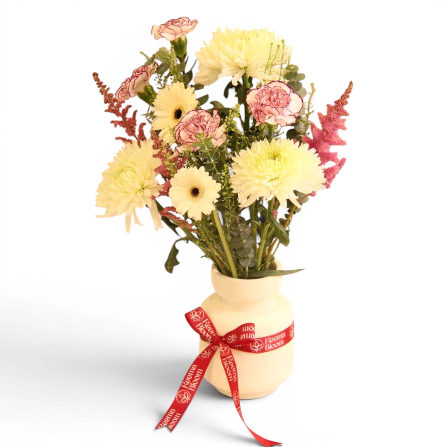 Bouquet of flowers in a vase with a red ribbon on a white background