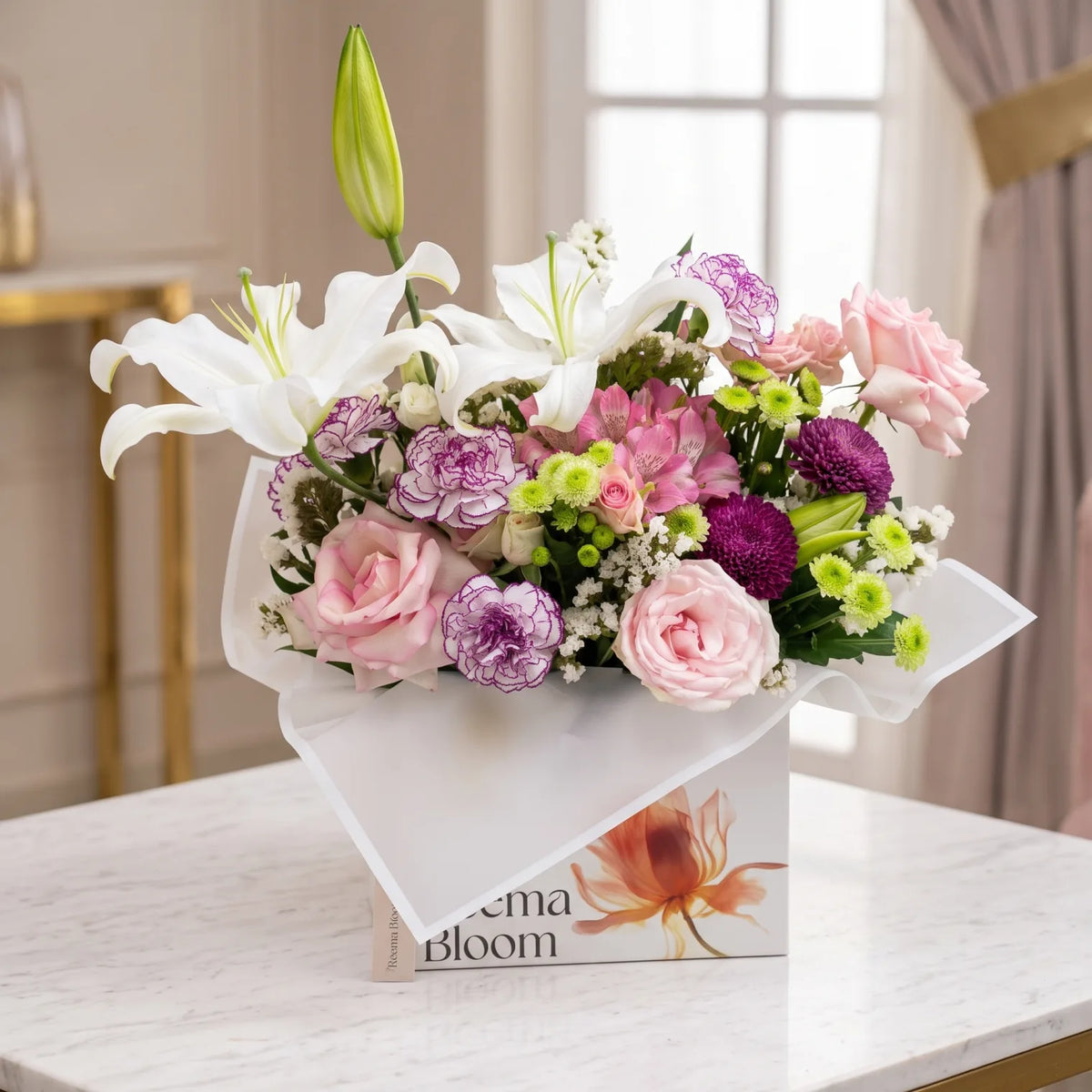 Reema Bloom Flower Box – Mixed Lilies, Roses, Carnations and Chrysanthemums with Greenery